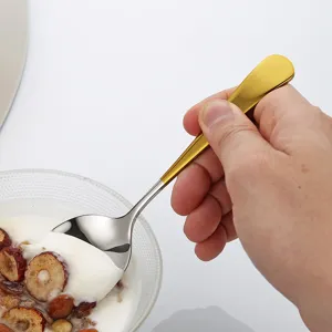 Thickened 304 stainless steel round spoon with gold handle for home dining, soup use.