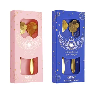 Stainless steel coffee spoon gift set with cherry and rose designs in pink and blue boxes.