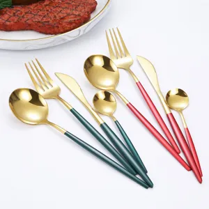 Stainless steel cutlery set with gold finish and colorful handles for western dining tableware.