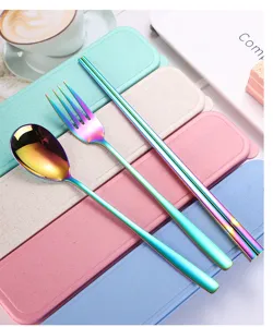 Detail shot of colorful titanium stainless steel cutlery set with portable wheat straw box.