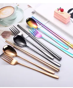 Stainless steel flatware set detail view, featuring rainbow, black and rose gold cutlery.