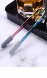 Rainbow stainless steel ice tong with silicone grip detail, perfect for bar and kitchen use.