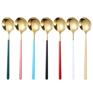 Set of 7 gold stainless steel spoons with colorful handles, creative cute kitchen cutlery.