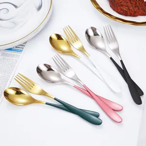 Stainless steel flatware set with colorful handles, modern kitchen spoon and fork combo.