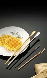 Stainless steel long handled stirring spoon and dessert fork detailed view showcase item