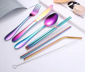 Rainbow stainless steel cutlery set detail, featuring fork, knife, spoon, and portable straws.