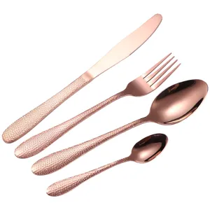 Roségoud RVS bestekset, 4-delige mes vork lepel set met gestructureerd handvat voor diner.