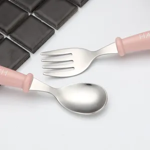 Edelstahl Kinderbesteck Set mit Löffel und Gabel, niedliches Design für Babynahrung.