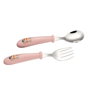 Kinder Edelstahl Löffel und Gabel Set mit süßen rosa Cartoon Griffen für Babyfütterung.
