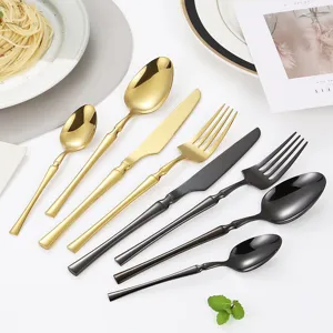 Stainless steel cutlery set gold and black knife fork spoon luxury modern tableware kitchen dining.