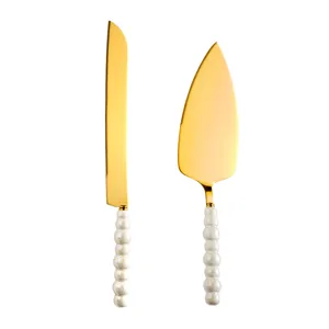 Gold stainless steel cake knife and server set with elegant pearl beaded handles for dessert baking.