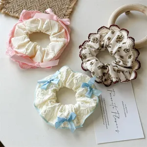 Sweet floral lace bow hair scrunchies detail view, cute hair rope tie for women daily style.