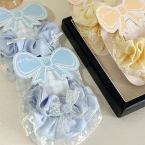 Sweet plaid fabric hair scrunchies detail view with delicate lace trim and cute bow card.