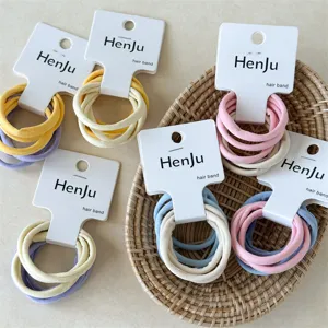 Minimalistische handdoek haarrekkers set met hoge elasticiteit en diverse kleuren.
