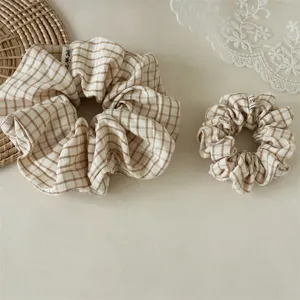 Ensemble chouchou à carreaux rétro français, élastiques à cheveux doux pour coiffure quotidienne.