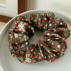 Christmas snowflake striped hair scrunchie detail shot, cute elastic ponytail hair tie for women.