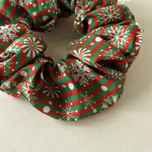 Christmas hair scrunchie with red green stripes and white snowflakes for daily styling.