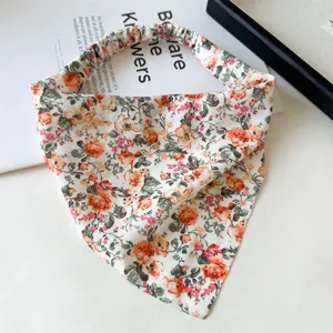 Detailed view of chiffon floral triangle hair scarf with elastic band for women spring style.