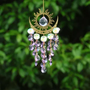 Crystal suncatcher hanging ornament with sun and moon metal design for garden decor.