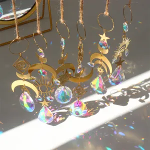 Crystal suncatcher hanging prism window ornament with metal moon star evil eye sun design.