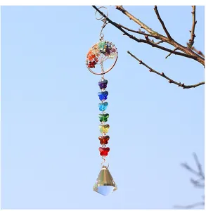 Tree of Life crystal suncatcher detail showing colorful butterfly beads and prism pendant.