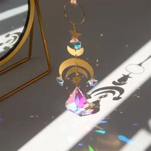 Crystal suncatcher prism hanging decor featuring celestial moon and sun refracting rainbow lights.