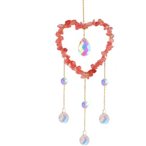 Handmade crystal gemstone heart suncatcher wind chime hanging ornament for home garden decor.