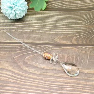 Crystal suncatcher hanging pendant with teardrop prism and decorative bead for garden decor.