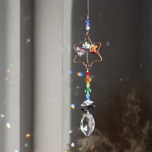 Crystal suncatcher hanging ornament with life tree design and colorful chakra beads.