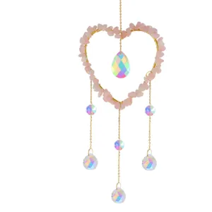 Handmade rose quartz crystal heart suncatcher wind chime with colorful hanging crystal pendants.
