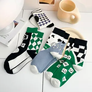 Trendy cotton mid-calf socks for women, featuring cute cow print, houndstooth and checkerboard styles.