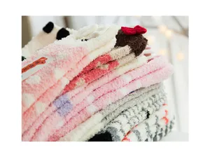Plush coral fleece fuzzy home socks with cute 3D bow and animal ear designs for winter.
