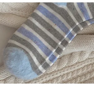 Thickened fuzzy striped mid-calf socks in grey with colorful neps and plush toe detail.