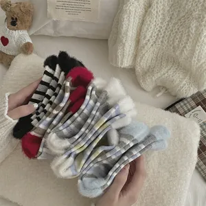 Thickened fluffy striped mid-calf socks for women, cozy winter thermal fuzzy hosiery.