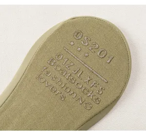 Detail view of women's anti-slip boat socks with silicone sole grip and solid color design.