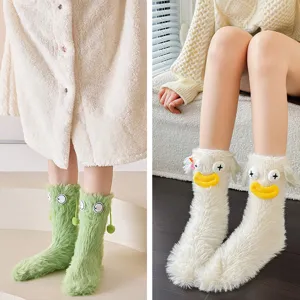 Cute fuzzy novelty socks for women, warm winter plush floor socks with funny big eye design.