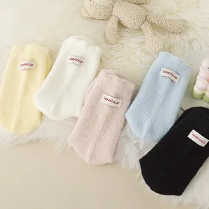 Fluffy winter fuzzy socks for women, thick warm plush sleeping floor socks with cute labels.