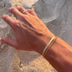 Men minimalist gold cuff bracelet and twisted chain two piece set for stylish daily wear.