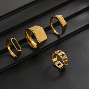 Stainless steel gold ring set for men, minimalist square signet and chain band jewelry detail.