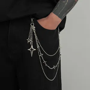 Detail shot of men metal hip hop pants chain with multi layer beads and four point star pendant.
