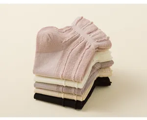 Detail view of Japanese style summer breathable women socks, stacked neatly in multi colors.