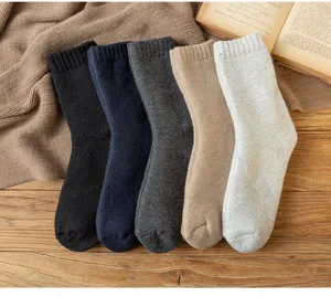 Thickened thermal winter mid-tube socks in five classic colors, cozy knit flat lay style.
