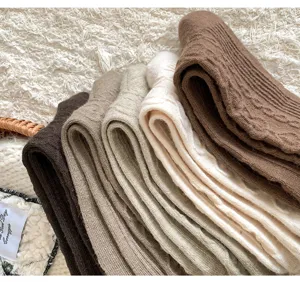 Thickened winter wool mid-tube socks with cozy cable knit design, soft and warm daily wear.