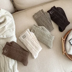 Winter thick thermal cable knit socks with cute heart patterns and cozy cotton blend fabric.