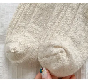 Women's glitter knit slouch socks cozy wool winter socks detailed texture close up view