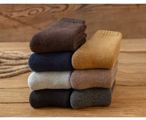Men's thick winter wool socks, extra warm plush mid-tube thermal knit socks for cold weather.