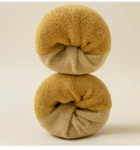 Detailed view of thick warm winter women's towel socks rolled neatly for cold weather.