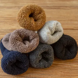 Men's thick winter thermal wool socks, extra plush warm cotton fleece crew socks for cold weather.