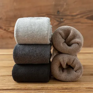 Thickened thermal knit leg warmers for women, cozy winter boot cuffs and knee covers.