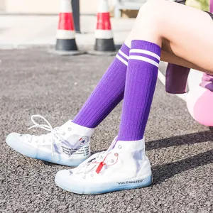 Solid color ribbed high tube socks for women, stylish candy color casual long knee socks.